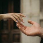 close up of hands touching