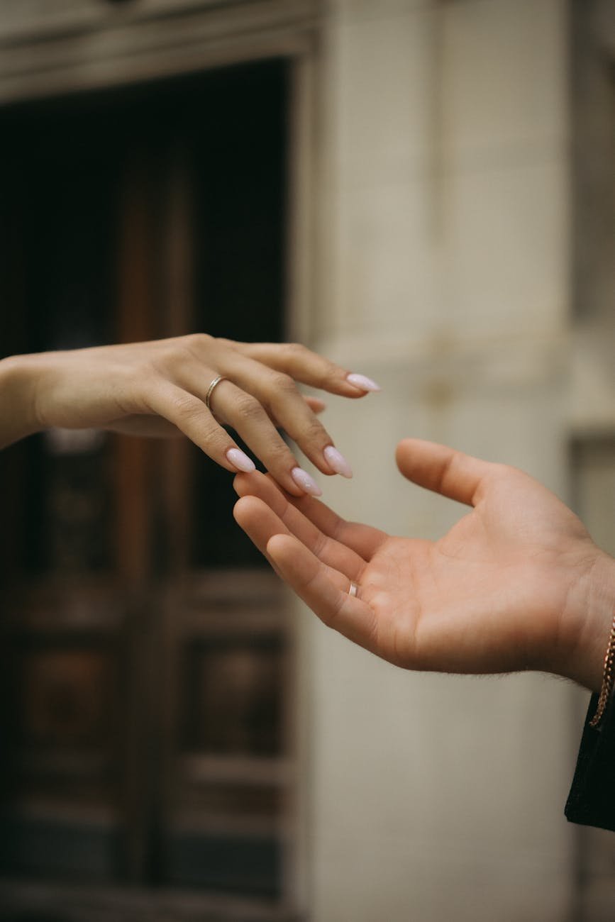 close up of hands touching