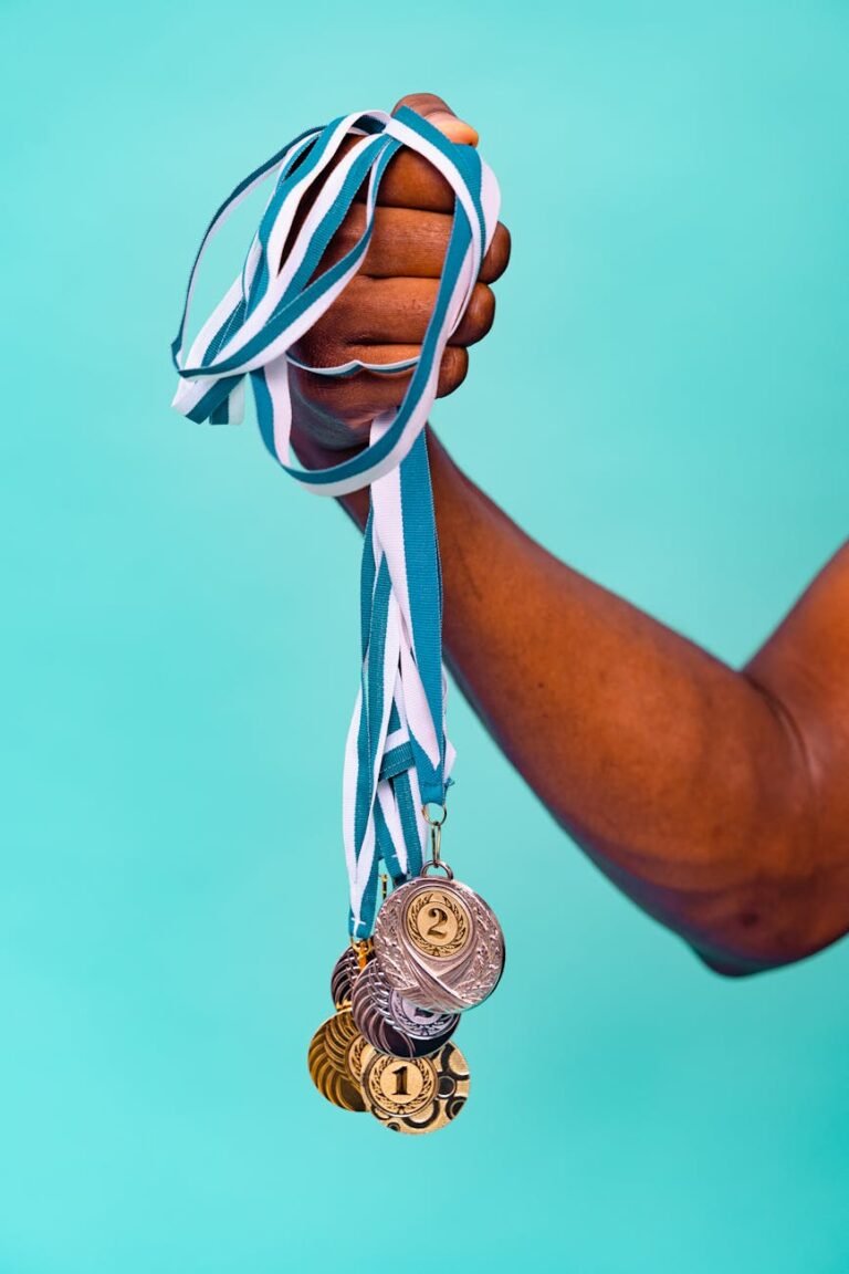 a person holding medals