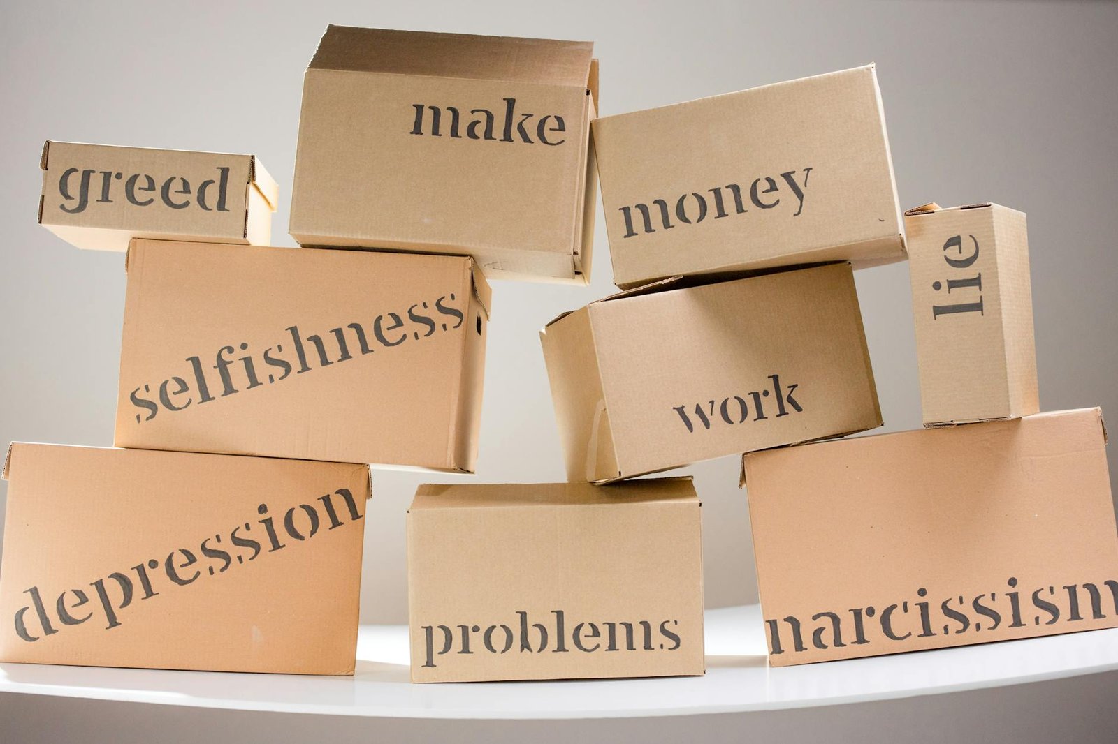 mental health problems written on cardboard boxes